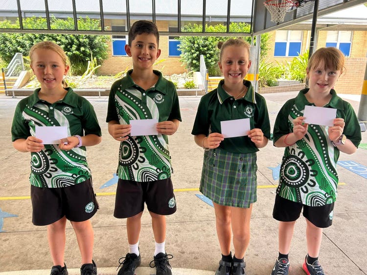 Four students receiving awards