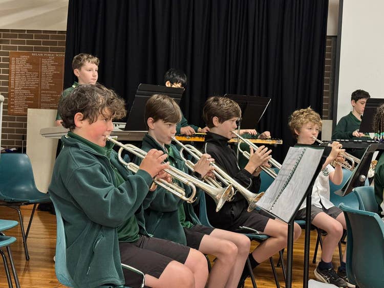 Students playing trumpets